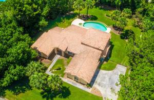 an overhead view of a large house with a swimming pool at SWISS 41 - Golf Course in Clermont
