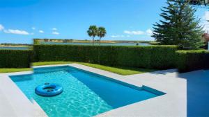 a swimming pool with a toy in the middle at Sumner Lake House 3B in Clermont