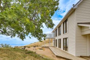 a house with a balcony on the side of it at Hiking, Wineries & More! Mtn-View Gem in Tehachapi in Tehachapi