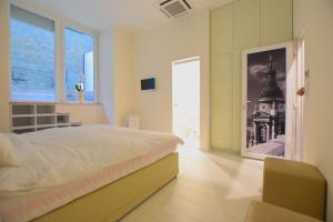 Posteľ alebo postele v izbe v ubytovaní Binder-Home Stylish Studios Budapest/Parliament