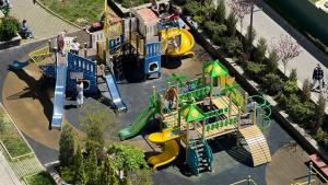 an overhead view of a playground with slides at Sea garden apartment in Kryzhanivka