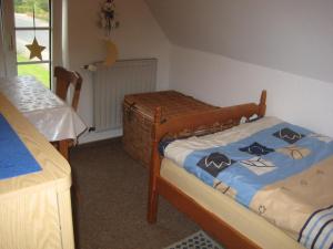 Una cama o camas en una habitación de Haus Bärbel
