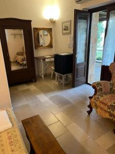 a living room with a couch and a table at Masseria Tolla in Ostuni