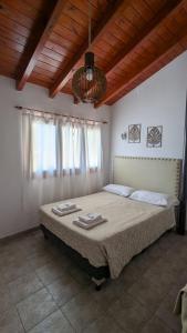 a bedroom with a large bed in a room at Hotel Cafayate in Cafayate +68 photos