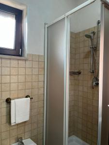 a bathroom with a shower and a sink at Masseria Tolla in Ostuni +78 photos