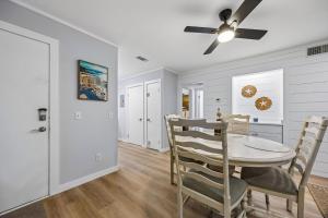 a dining room with a table and chairs at 8A Amelia Landings Condo in Fernandina Beach