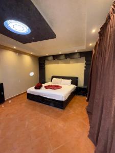a bedroom with a bed in a room at Porto Sokhna Penthouse with Private Pool - MR in Ain Sokhna +66 photos