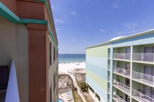 a view of the beach from the balcony of a hotel at Harbour Place 510 in Gulf Shores