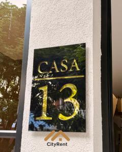 a sign on a building that says casa at Casa Martina premiun in Buga +5 photos