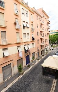 an empty street in front of a building at 100 Passi dal Porto in Civitavecchia