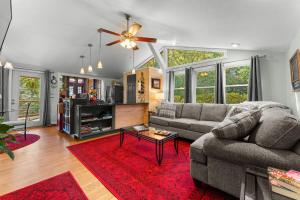 a living room with a couch and a table at 826 Wilson Road in Highlands
