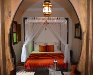Postel nebo postele na pokoji v ubytování Riad Ghali Hotel & SPA + 37 fotografií