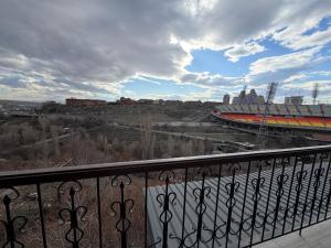 a view of a stadium from a balcony at In City Hotel in Yerevan +25 photos