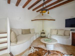 a living room with a couch and a table at C'AN Sabuba in Deia