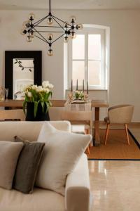 a living room with a couch and a table at Old Town Oasis in Dubrovnik