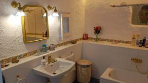 a bathroom with a sink and a mirror at Ca na Pereta in Sencelles +51 photos