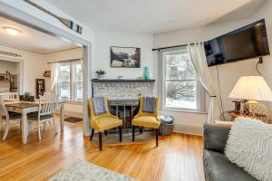 a living room with a couch and a table at Walkable 3-Unit Hub: 8 Mi to Micron Technology! in Phoenix