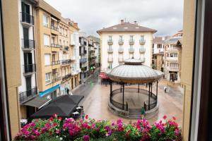 a view of a city street with a gazebo at Musika Plaza in Zarautz