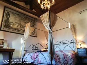 Postel nebo postele na pokoji v ubytování Residenza Bra Verona