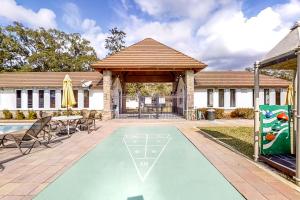 a house with a swimming pool with a gazebo at Fish, Hike & Unwind! Quiet Haven in Steinhatchee in Steinhatchee