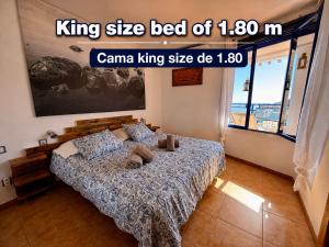 Llit o llits en una habitació de Sunset Taurito con vistas al mar increíbles