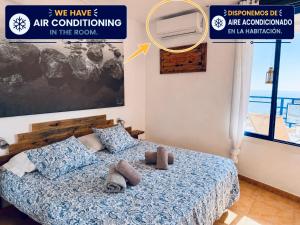 Llit o llits en una habitació de Sunset Taurito con vistas al mar increíbles 30 fotos més