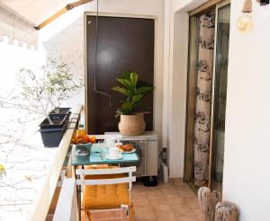 a dining room with a table with oranges on it at Cap SOLEIL in Antibes +7 photos