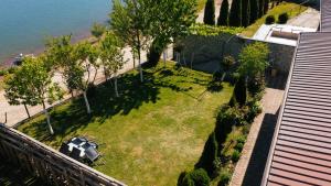 an aerial view of a park next to the water at Lake of Diber in Debar