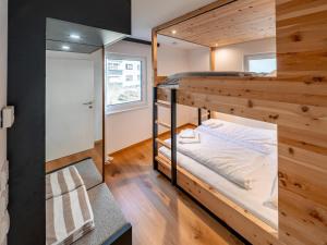 a bunk bed in a tiny house at Mariazeller Zirbennest in Mariazell