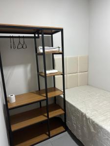 a room with a bunk bed with a bunk bed gmaxwell gmaxwell gmaxwell gmaxwell gmaxwell gmaxwell at D Castro Art House in Montes Claros