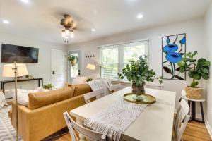 a living room with a couch and a table at Meme & Papas Compound 2 Homes, Hot Tub in Afton