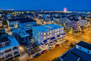 an aerial view of a city at night at The Linda Grande Hotel in Ocean City
