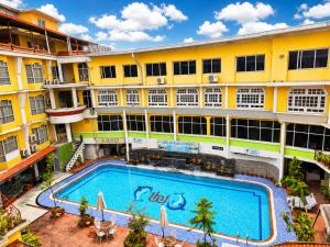 an overhead view of a large building with a swimming pool at Woodland Heritage Hotel in Kathmandu