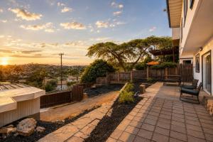 a patio with a view of a city at 2Homes Villa Renovated Views in La Mesa +37 photos