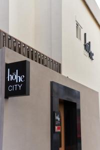 a halo city sign on the side of a building at Hohe City Dongdaemun in Seoul
