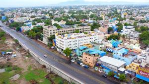 an aerial view of a city with a highway at Hotel Shree Laksha Residency Madurai in Madurai