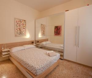 Vuode tai vuoteita majoituspaikassa Cà Venier