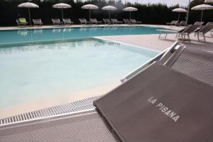 The swimming pool at or close to Agriturismo La Pisana