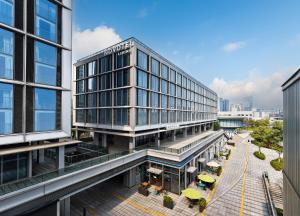 an overhead view of a building in a city at Novotel Living Hangzhou International Convention Center in Hangzhou