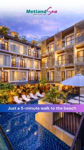a hotel with a swimming pool and a resort at Metland Seva Seminyak - Formerly Horison Ultima Seminyak in Seminyak