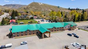 an overhead view of a building with a green roof at Super 8 by Wyndham Montpelier - Bear Lake in Montpelier