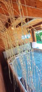a bunch of ropes hanging from the ceiling of a boat at Le Rensy in Ferrières