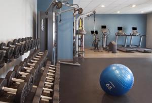 a gym with a large blue gym ball in the middle at Hampton Inn & Suites Natchez in Natchez