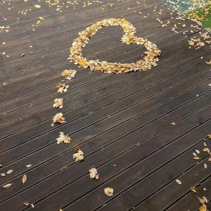 a necklace on top of a wooden deck at Cheongdo Provence Glamping in Cheongdo +26 photos