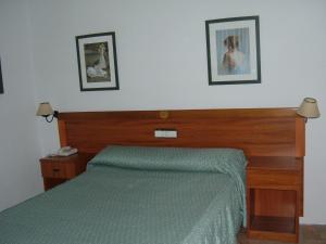 Postel nebo postele na pokoji v ubytování Hotel Rural Casares