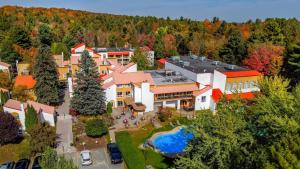 an aerial view of a house with a yard at Hotel Cheribourg, an Ascend Collection Hotel in Magog-Orford