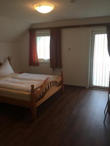 Postel nebo postele na pokoji v ubytování Ferienhaus Strasswirt