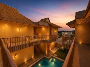 an aerial view of a house with a swimming pool at The Ark Resort in Bhopal