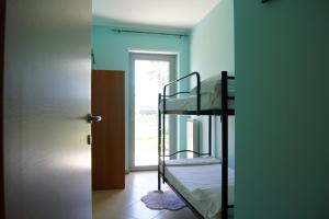 Postel nebo postele na pokoji v ubytování Le Dune per 4