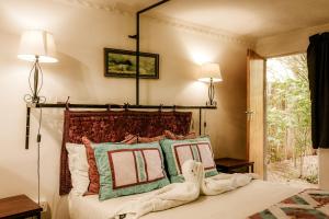 เตียงในห้องที่ Kasane Self Catering +19 ภาพ